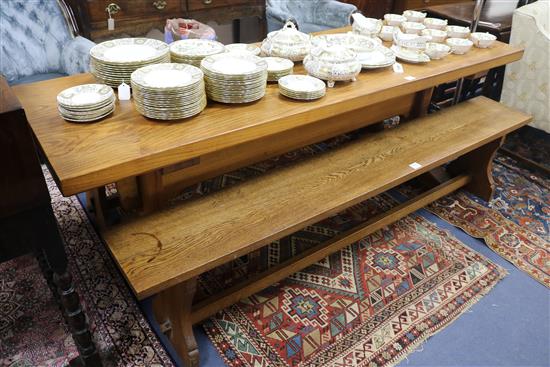 A substantial oak refectory table and a pair of matching benches, Table W.214cm, Benches W.198cm